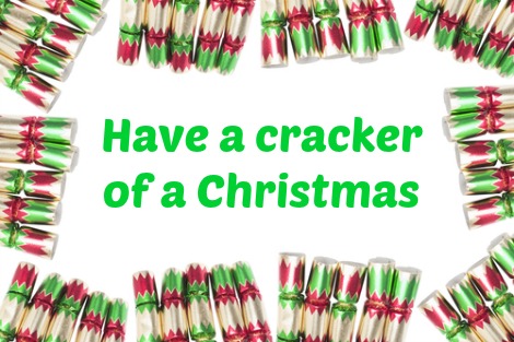 Border of Christmas crackers surrounds the words 'Have a cracker of a Christmas'