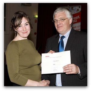 Cara Munro, third place in the 2008 Margaret Dooley Award, receives her award from Brendan Kilty