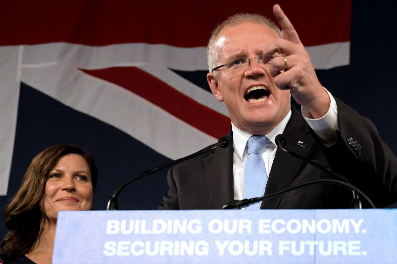 Prime Minister Scott Morrison, flanked by his wife Jenny Morrison, delivers his victory speech at the Sofitel Sydney Wentworth on 18 May 2019 in Sydney. (Photo by Tracey Nearmy/Getty Images)