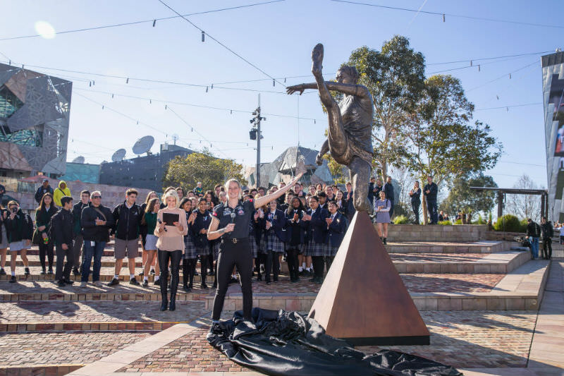 Tayla Harris unveiling the statue of her kick in Federation Square (Wayne Taylor/Getty Images)