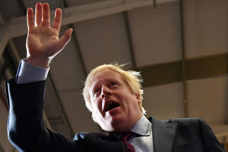 British Prime Minister Boris Johnson on the campaign trail in December 2019. (Photo by Ben Stansall — WPA Pool/Getty Images)