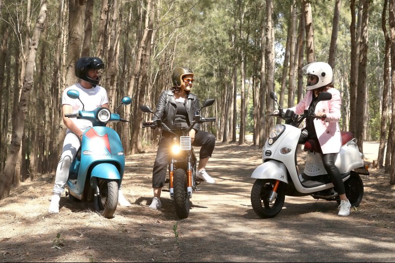 Grant Siermans on a Fonzarelli Arthur electric scooter, Michelle Nazzari on a Fonzarelli NKD electric motorbike and Sara Davenport on a Fonzarelli X1 electric scooter pose ahead of the Electric Vehicle Show 2019 at Sydney Olympic Park on 25 October 2019. (Photo by Mark Kolbe/Getty Images)