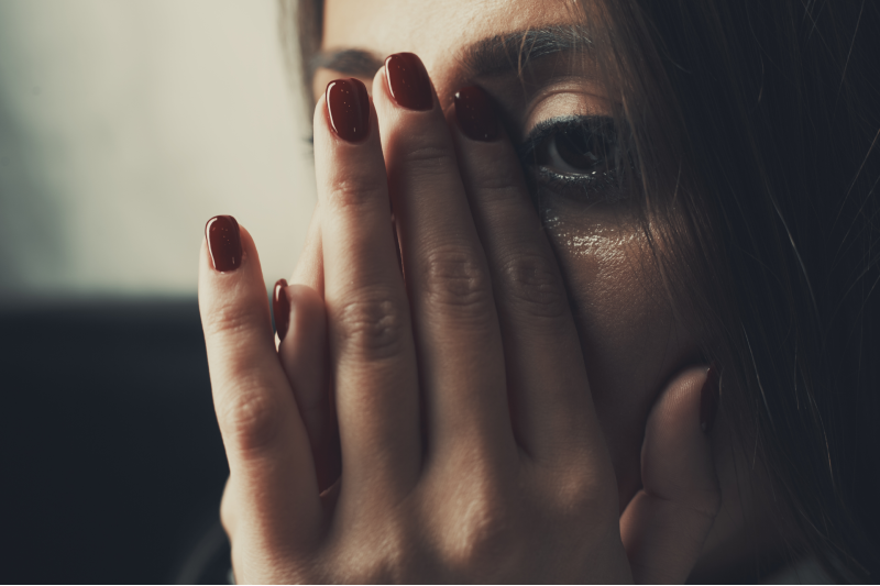 Crying woman image credit: Arman Zhenikeyev / Getty