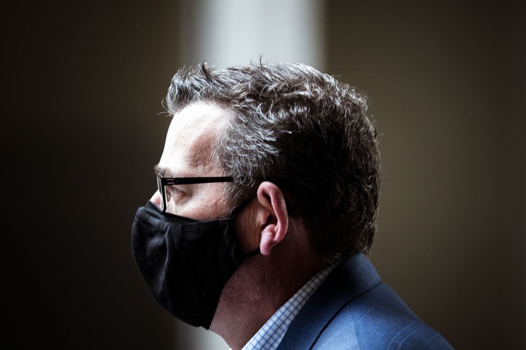 Main image: Side view of Daniel Andrews (Darrian Traynor/Getty Images)