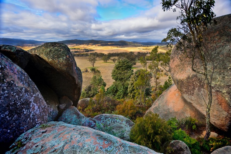 View for cluster of local pink granit boulder over looking valley leading towards township of Tarana in Central NSW. Near Bathurst. (John Clutterbuck/Getty Images)