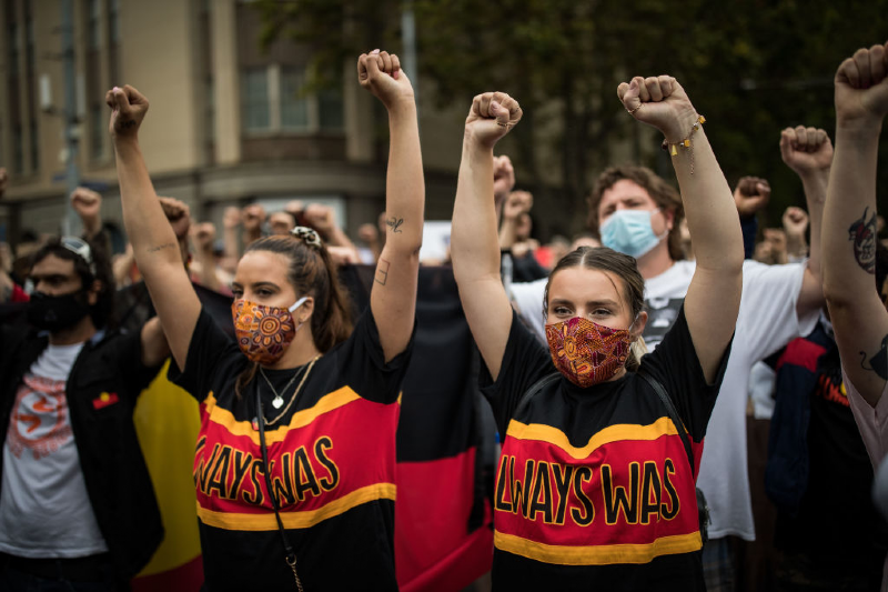 Main image: Invasion Day protestors Melbourne (Darrian Traynor/Getty Images)