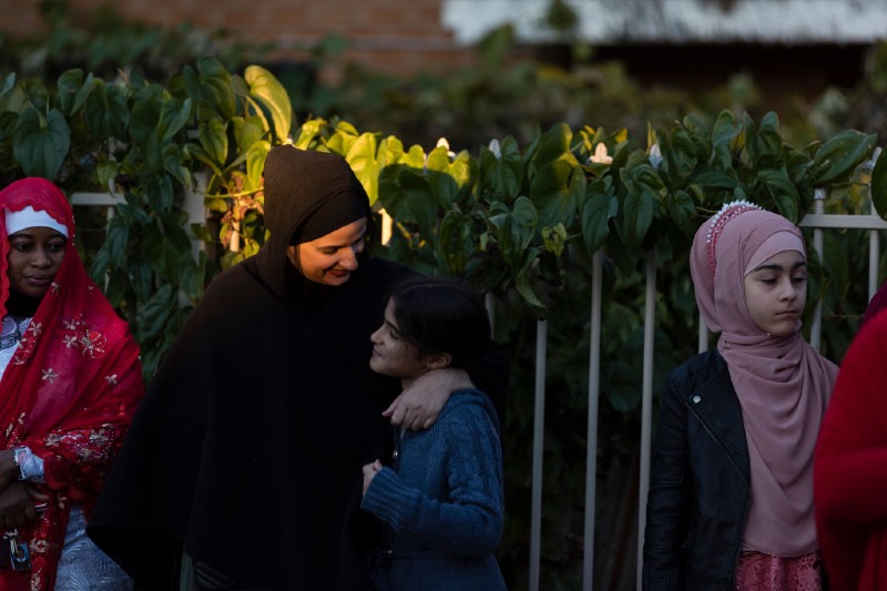 Families wait for morning prayers outside Sydney mosque (Brook Mitchell/Getty Images) 