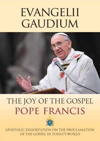 The cover of an English Language publication of 'Evangelii Gaudium' features a smiling Pope in mid-sentence behind a lectern