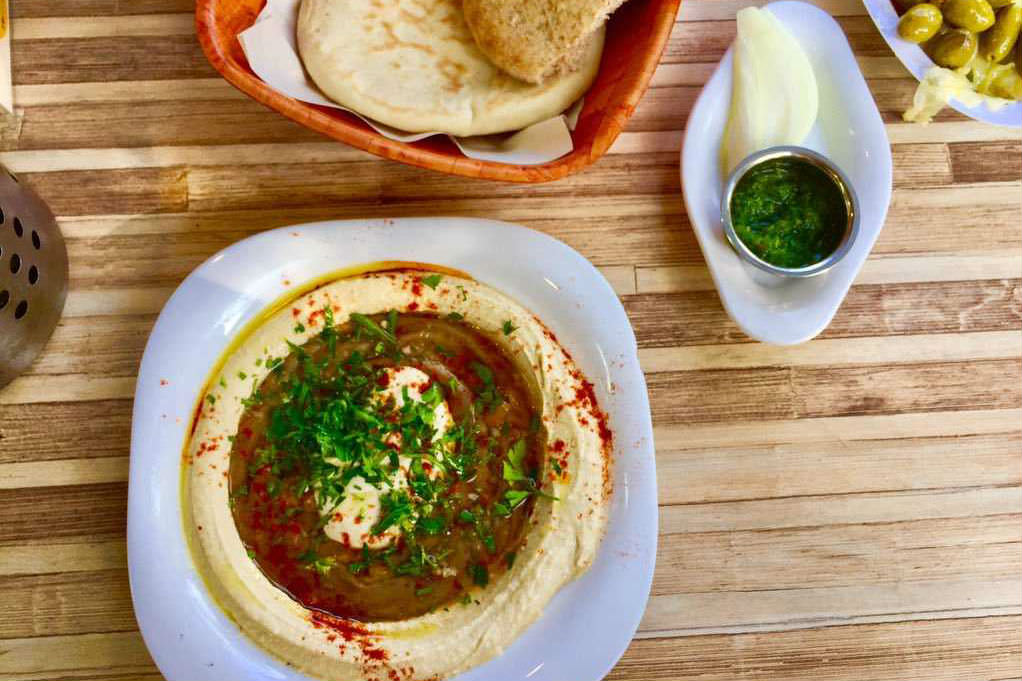 Hummus and accompaniments, photo by Na'ama Carlin