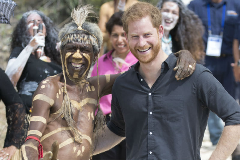 Prince Harry stands with Aboriginal man Joe Gala at McKenzie's Jetty where he took part in an aboriginal cleansing ceremony on Fraser Island (Stephen Lock - Pool/Getty Images)