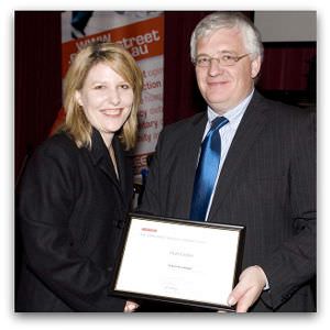 Ruth Limkin, winner of the 2008 Margaret Dooley Award, receives her award from Brendan Kilty